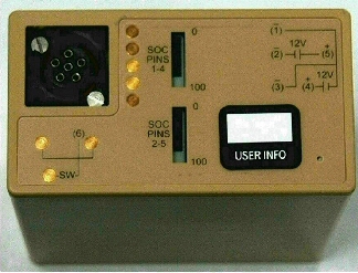 Top of BB-2590/U battery showing the gas gauges